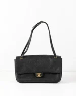 Chanel Maxi flap bag, Grained calfskin & gold-tone metal, black
